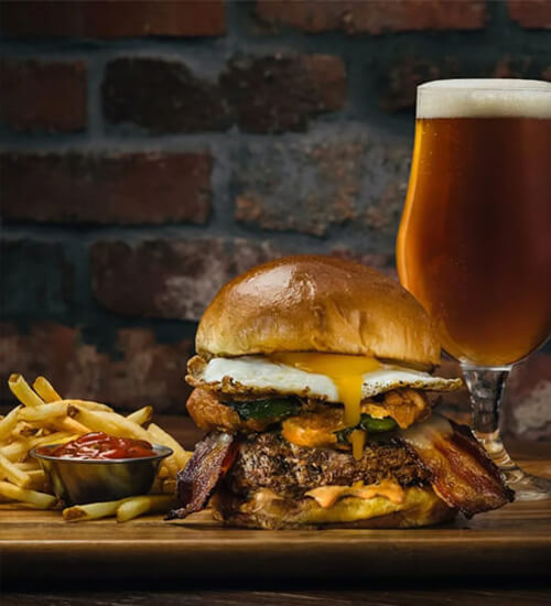 Picture of a hamburger and a beer