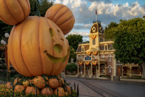 Image of a large pumpkin shaped Mickey mouse on Main St in Disneyland