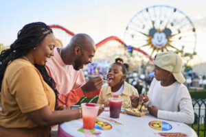 Family eating lunch inside Disney California Adventure Park
